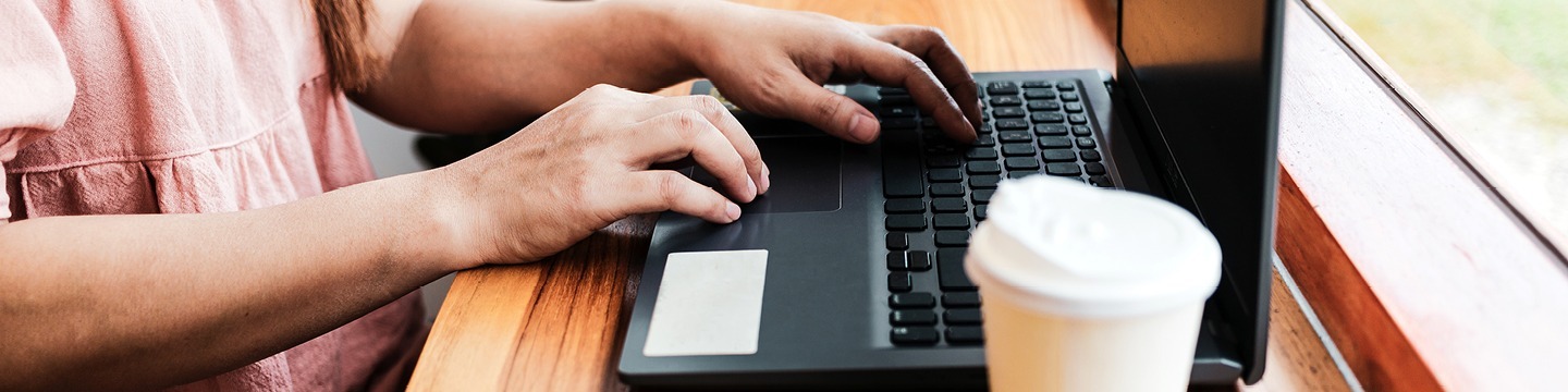 Person typing on a laptop