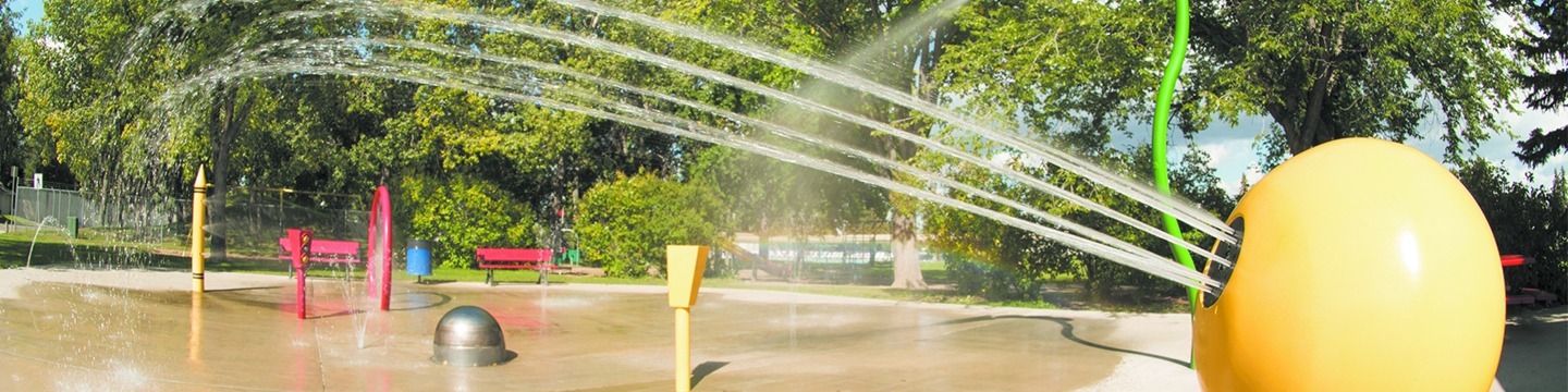 Spray pad spraying water